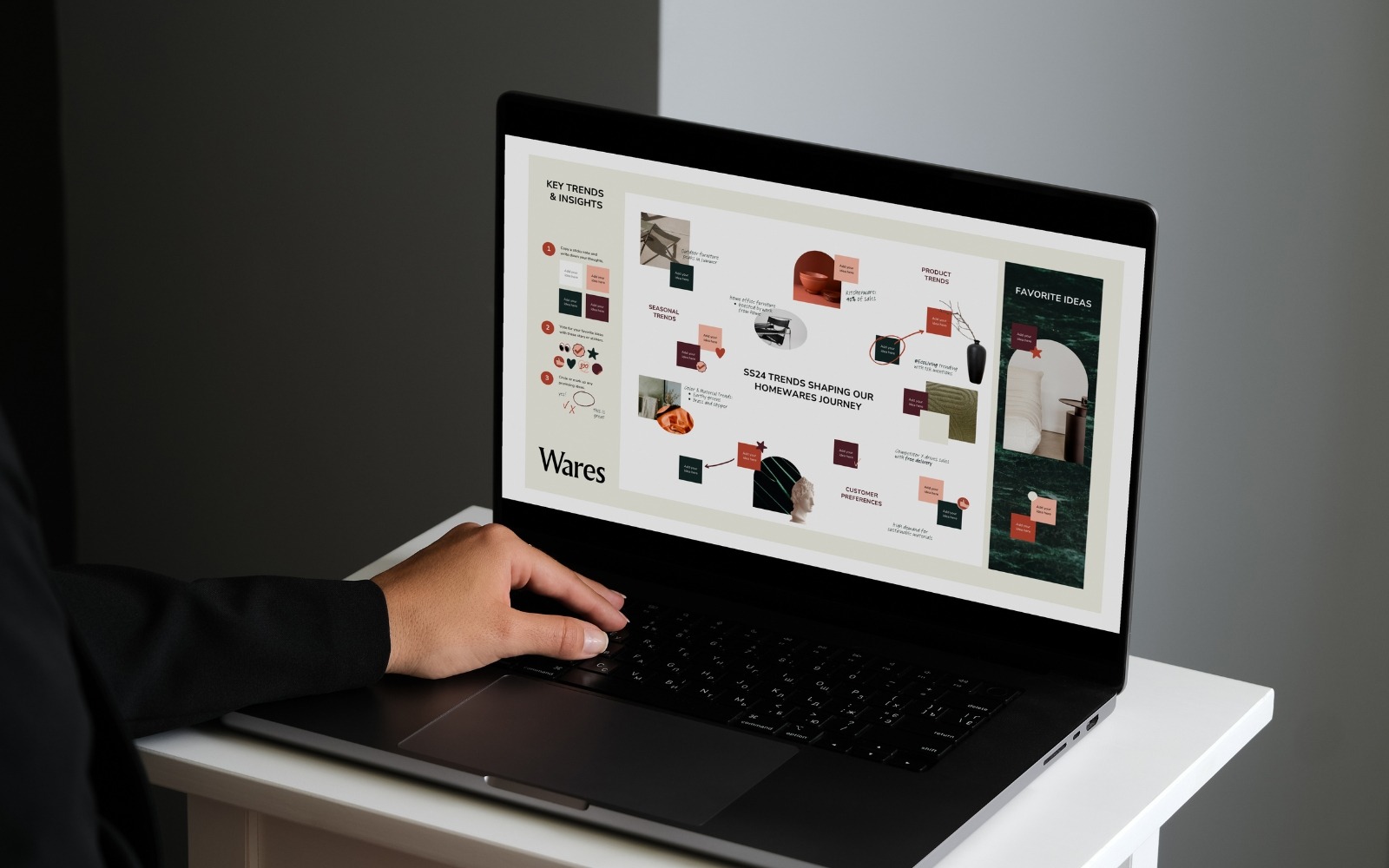 A laptop displaying a visual brand strategy dashboard with key trends, seasonal insights and product direction for a home textiles brand, showing how digital marketing planning looks for textile businesses